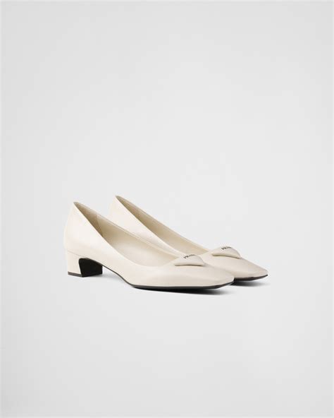 Ivory Patent Saffiano Leather Pumps .